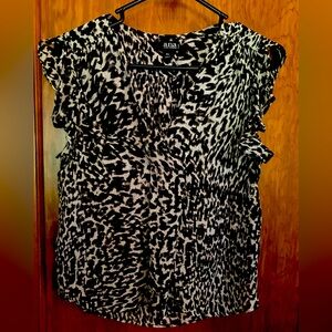 a.n.a black and white animal print short sleeve v-neck blouse.Size petite small.
